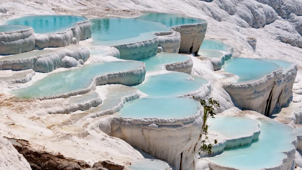 Turquoise pools in travertine terraces at Pamukkale, Turkey 